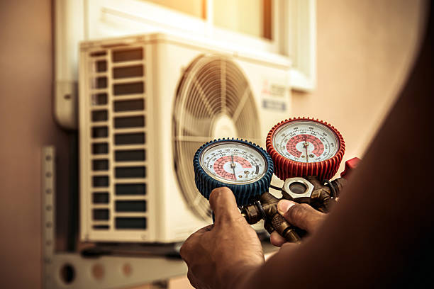 Professional Heat Pump Repair technician working in Walcott, IA